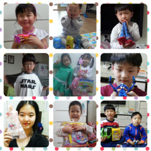 Kids at Samsungwon receive their presents on Children's Day, May 5, 2016